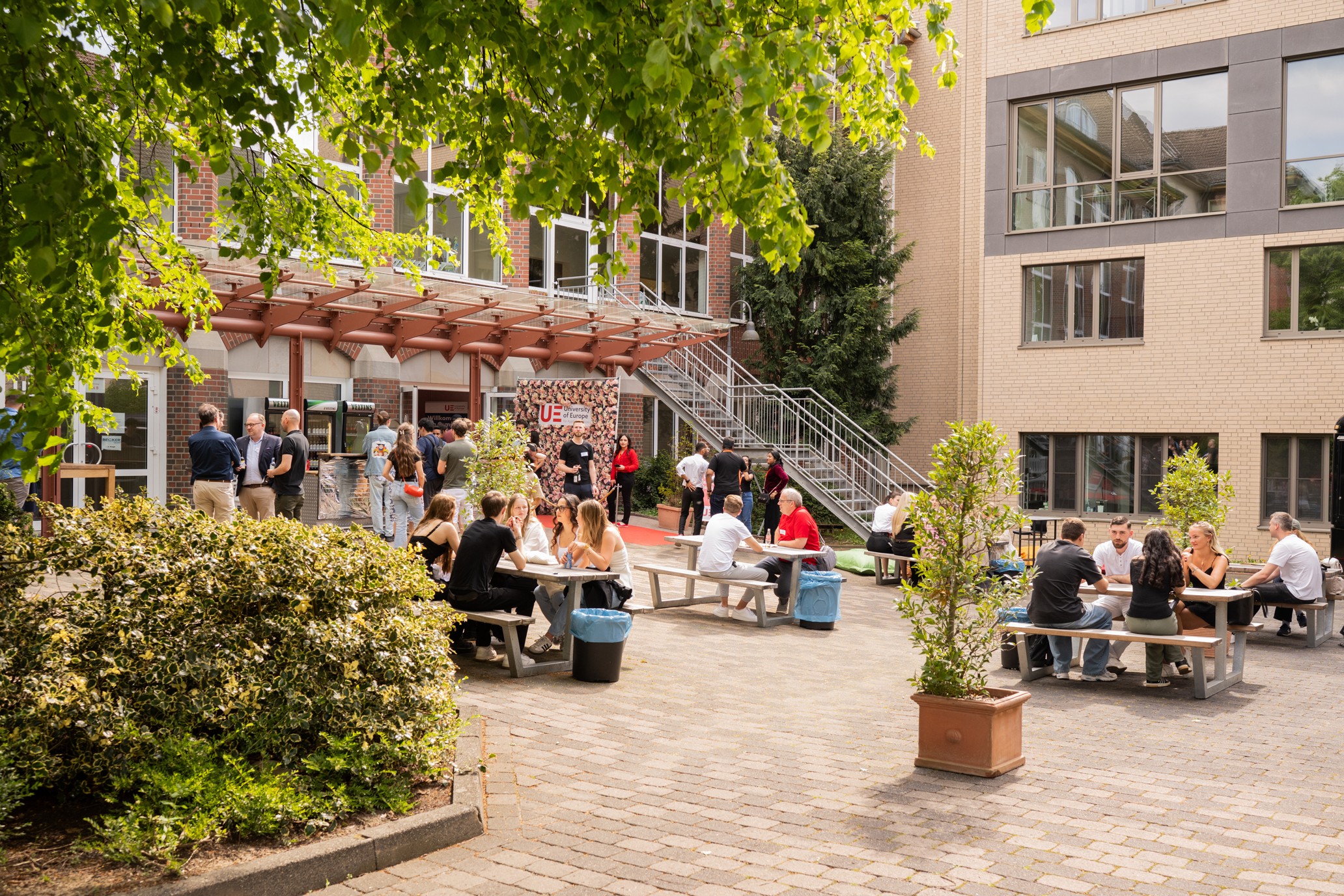 a group of people sitting outside