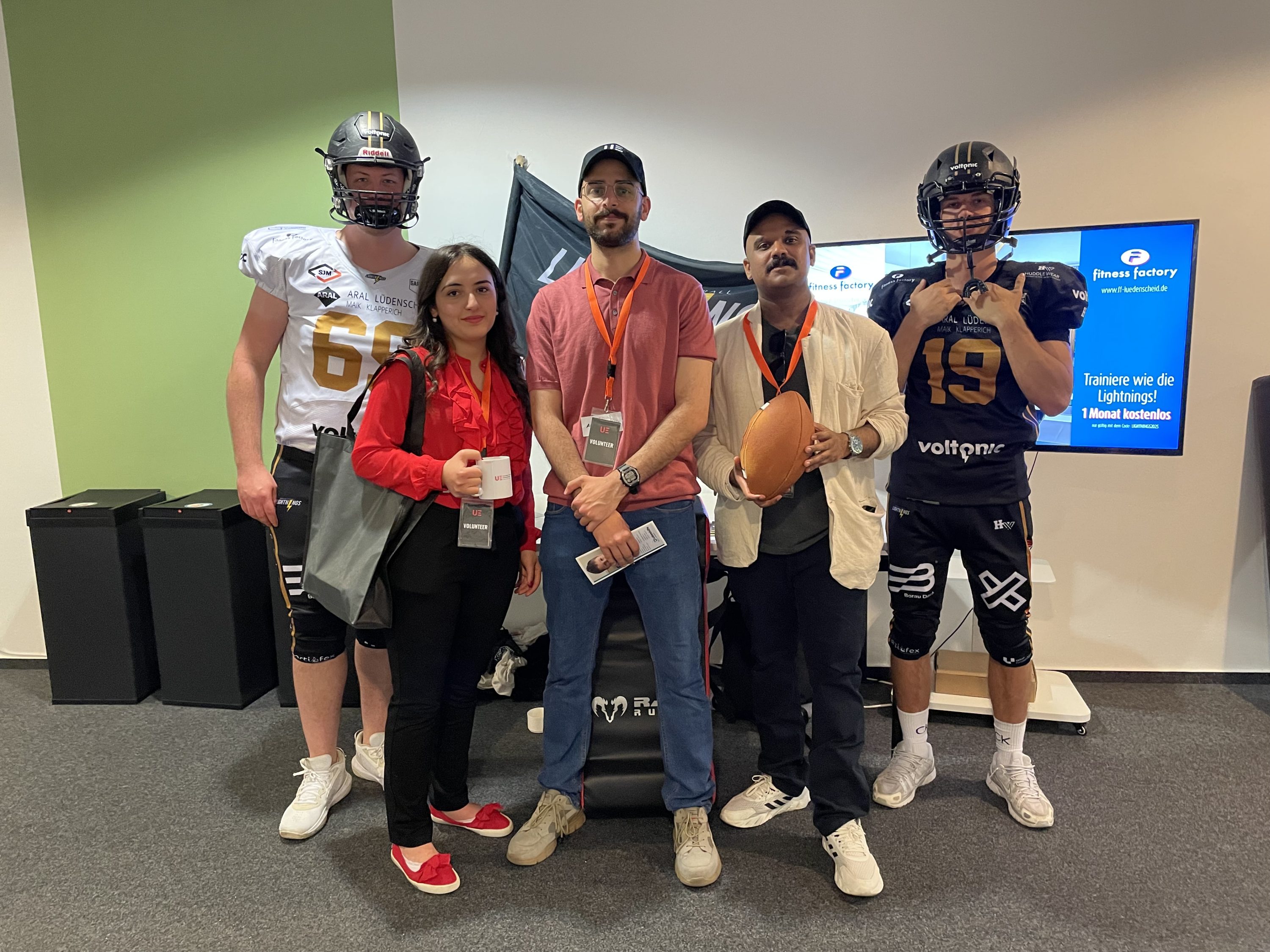 a group of people posing for a photo